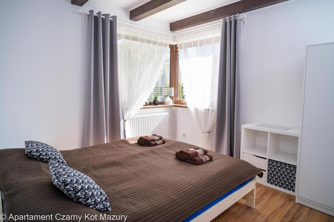 Villa Czarny Kot Mazury Dom Caloroczny à Malkinie Extérieur photo